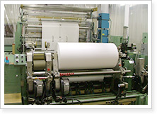 Large slitting machine with corona processing